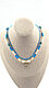 Choker met turkooise natuurstenen en ketting